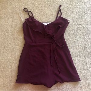 Socialite plum romper size small NWT
